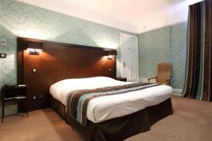 Hotels Le Grand Hotel : photos des chambres