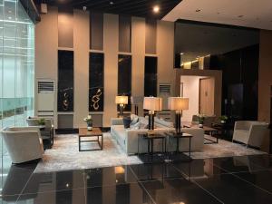 Cozy Cool Condo in Makati - 4-звездочные отели в городе Манила