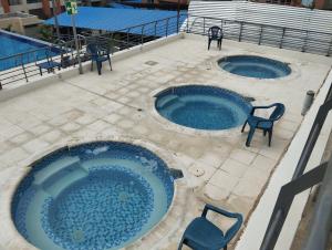Apartaestudio Vacacional en Girardot, piscinas, Jacuzis, parqueadero para moto