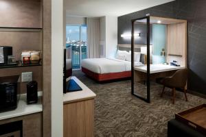 King Suite with Sofa Bed and Balcony - Hearing Accessible room in SpringHill Suites by Marriott Clearwater Beach
