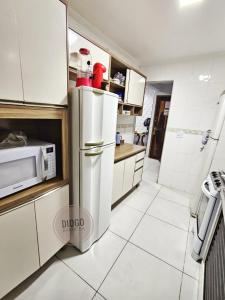 apto frente praia pé na areia 2dorm wifi elevador Smart tv praia grande aviação - leia fotos