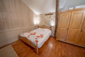 Maisons de vacances Magnifique longere en pierre du Lot Piscine Privee : photos des chambres