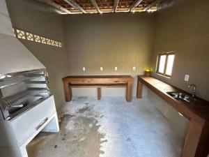 Casa privativa com piscina na Praia da Ferrugem duas quadras mar REF 100