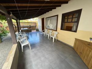 Casa privativa com piscina na Praia da Ferrugem duas quadras mar REF 100