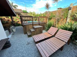 Casa privativa com piscina na Praia da Ferrugem duas quadras mar REF 100