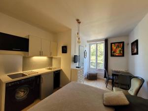 Appartements Le Beau Site : photos des chambres