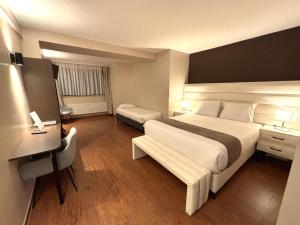 Standard Triple Room room in Escale Hotel