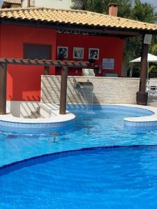 Village aconchegante próximo à praia e à vila