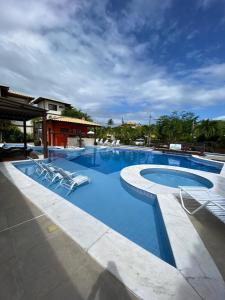 Village aconchegante próximo à praia e à vila