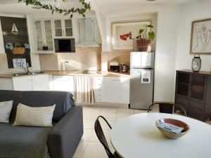 Appartements Cote Baie avec parking wifi draps et serviettes : photos des chambres