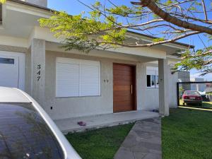 Casa ampla jardim beira mar