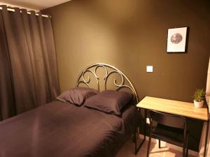 Les chambres de Sandrine avec salle deau privée dans un appartement en collocation