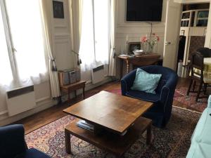 Appartements Le 35 rue Coquilliere with airport pick-up service : photos des chambres