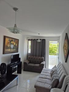 Apartamento com três quartos pé na areia