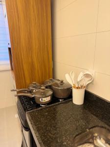 Apartamento quarto e sala a 260m da Praia