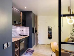 Appartements Luxe studio 10min metro from the Center of Paris : photos des chambres