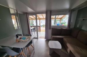 Campings Cosy et chaleureux, 2 ch, 2 sdb pour votre confort, super equipe : photos des chambres