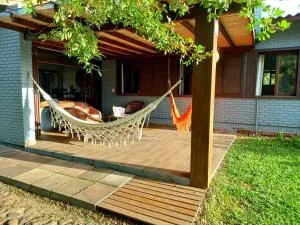 Casa Atlântida quadra mar, na melhor localização da praia - Xangri-lá