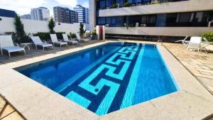 Flat Completo com cozinha no Melhor da Pituba, WIFI, Ar, Netflix, EDF Frente Mar, Piscina