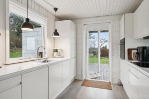 Beautiful And Well-Maintained Two-Level Holiday Home With Several Terraces And Lovely Sea Views Close To The Beach, Forest And The Charming Harbour