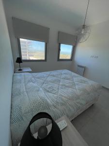 Departamento de lujo frente al mar con vista panorámica, pileta y cochera privada