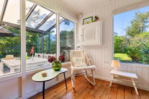 Cosy Classic Holiday Cottage With A Covered Terrace And Large Natural Plot Just A Few Minutes Walk From The Family-Friendly Ahl Beach