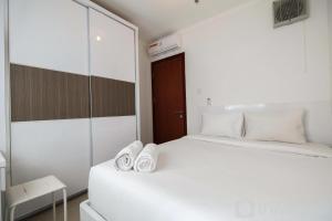 Homey 2BR Signature Park Grande Apartment By Travelio