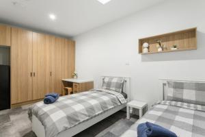 Cozy Stays - Private Rooms in Adelaide CBD with Shared Facilities
