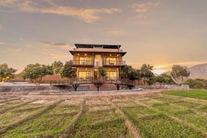 ELIVAAS Cows & Cuddles 4 BHK with Pvt Pool and Garden