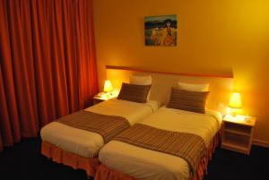 Hotels Hotel Tambourin : photos des chambres