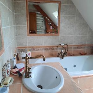 Appartements courseullescommealamaison : photos des chambres