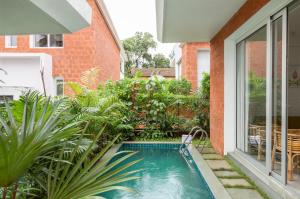 La Olalian 2 & 3 BHK Designer Villas Near Anjuna Beach with Private Pool & Sun Deck & Garden