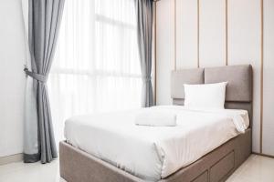 2BR Luxury Modern Ciputra International Apartment By Travelio