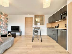 Appartements La Roseraie - Hyper Centre - Parking Privatif : photos des chambres