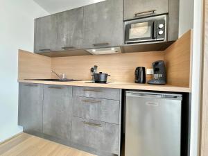 Appartements La Roseraie - Hyper Centre - Parking Privatif : photos des chambres