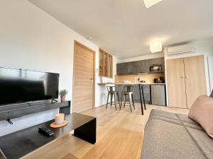 Appartements La Roseraie - Hyper Centre - Parking Privatif : photos des chambres