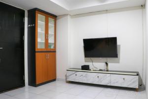 Warm and Homey 2BR at Sentraland Cengkareng Apartment By Travelio