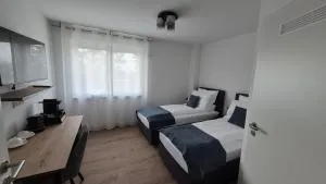 Apartments Seibel Doppel-Zweibettzimmer mit Bad - Dettingen an der Erms