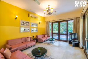 StayVista at The Manvi Estate - Pool, WiFi & Bonfire