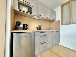 Appartements L-Ecrin de verdure - Calme - Parking Prive - Central - Neuf : photos des chambres