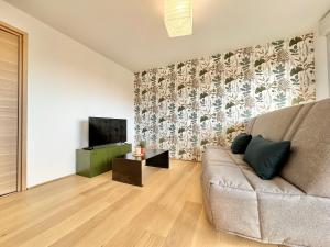 Appartements L-Ecrin de verdure - Calme - Parking Prive - Central - Neuf : photos des chambres