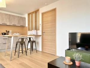 Appartements L-Ecrin de verdure - Calme - Parking Prive - Central - Neuf : photos des chambres