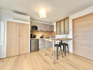 Appartements L-Ecrin de verdure - Calme - Parking Prive - Central - Neuf : photos des chambres