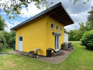 Tiny house with gallery and garden for 3 people