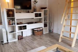 Tiny house with gallery and garden for 3 people