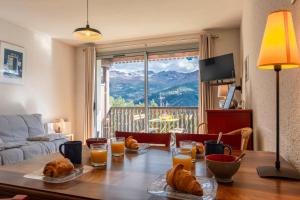 Appartements Escapade Perchee - Vue - Balcon - Parking : photos des chambres