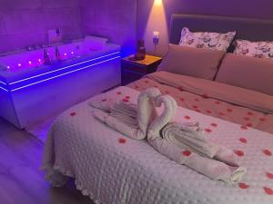 Appartements Baignoire Balneo romantic experience - L-epoque : photos des chambres