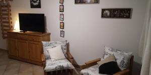 Appartements LOGEMENT 4 PERSONNES : photos des chambres