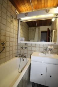 Appartements Au petit Huez : photos des chambres