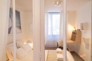 Appartements Le Quai de Prague - Cosy - Central - Loire - Parking gratuit dans la rue : photos des chambres